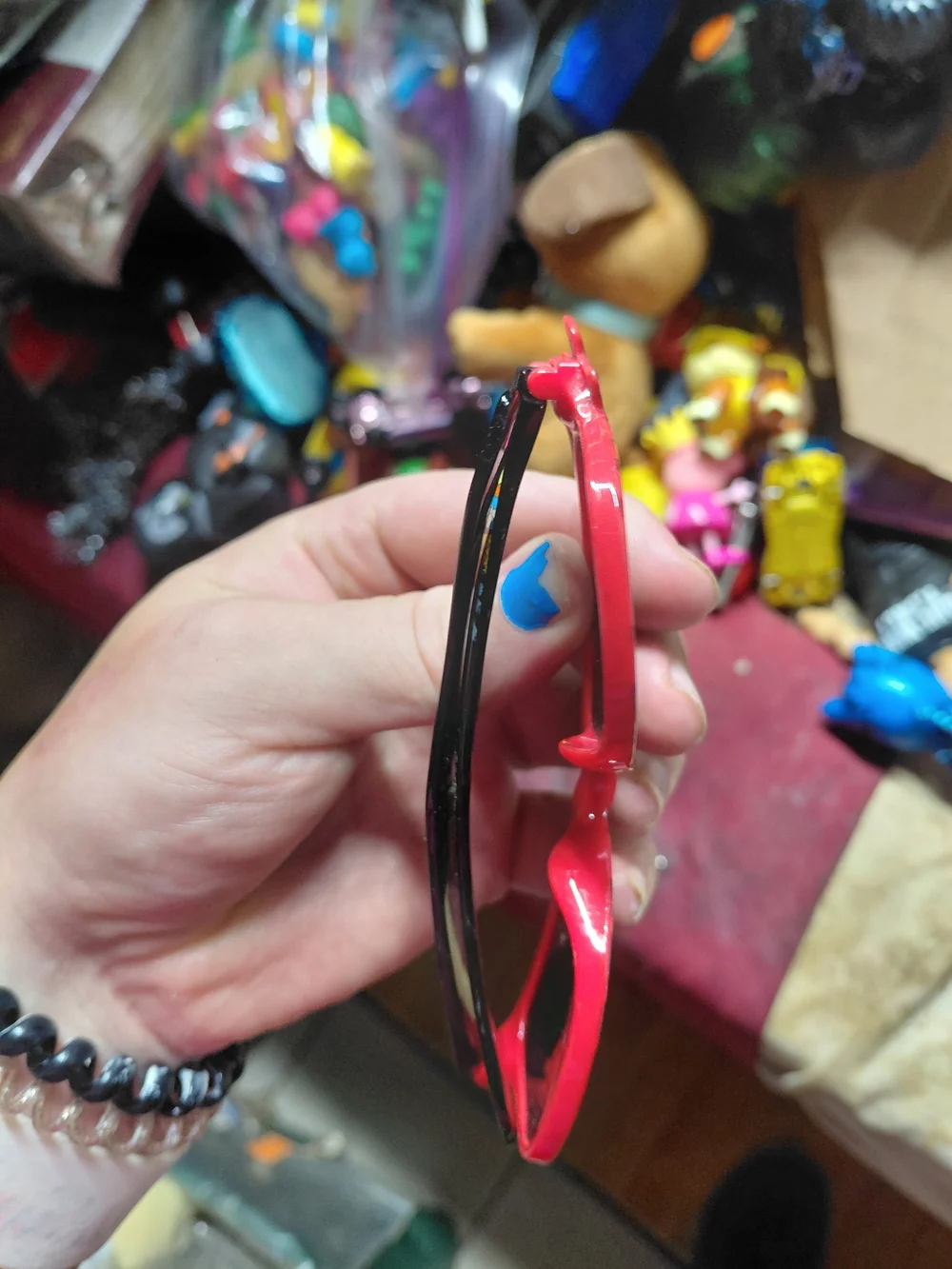Nintendo Pokémon Pikachu sunglasses feature a red frame with a Poké Ball pattern
